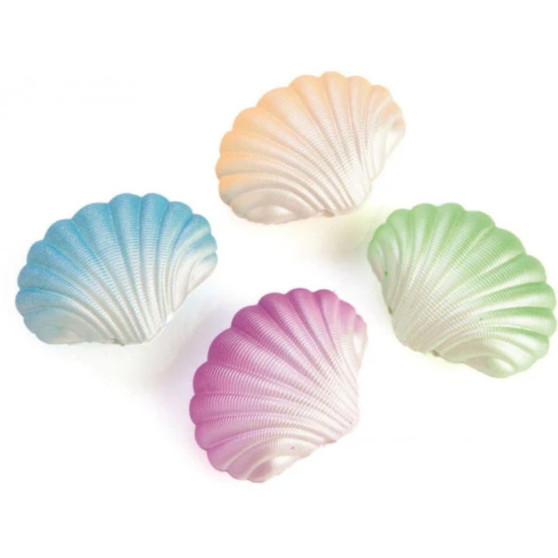 Growing Mermaid in Clam Shell