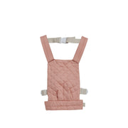 A qulited rose Olli Ella Doll Carrier with padded straps designed for carrying dolls.
